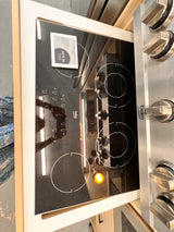 BEKO 30 inch black glass, built-in electric cooktop. ECTM30102.