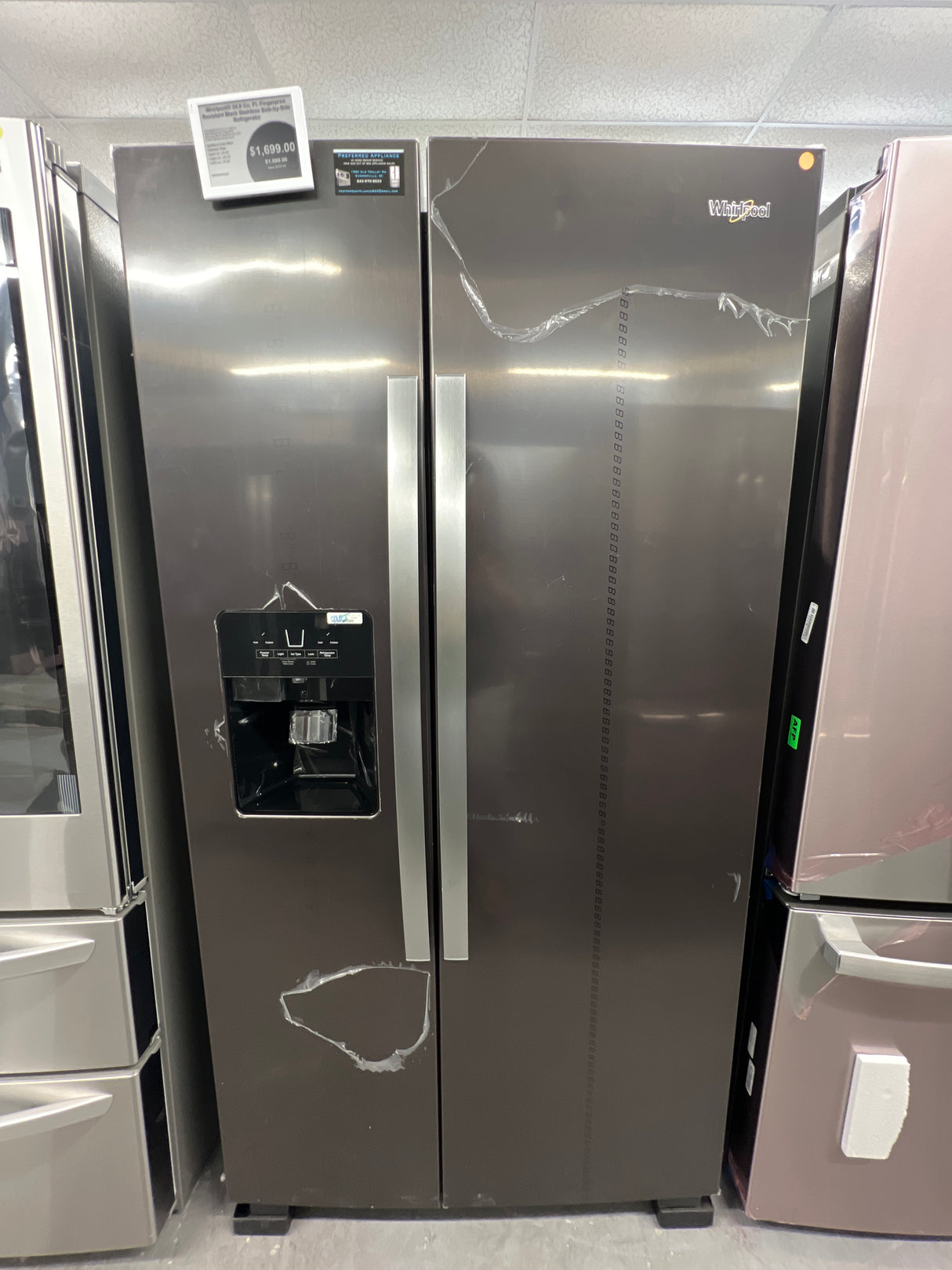WRS325SDHV/SD whirl, pool, 24.6 ft.³ fingerprint resistant black, stainless side-by-side refrigerator.